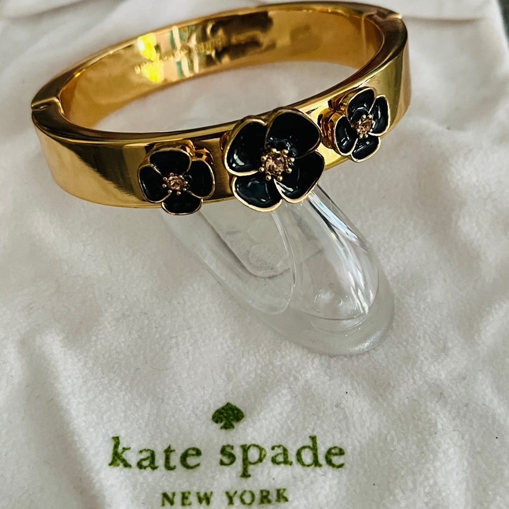Kate Spade Gold Bracelet with Black Floral Design